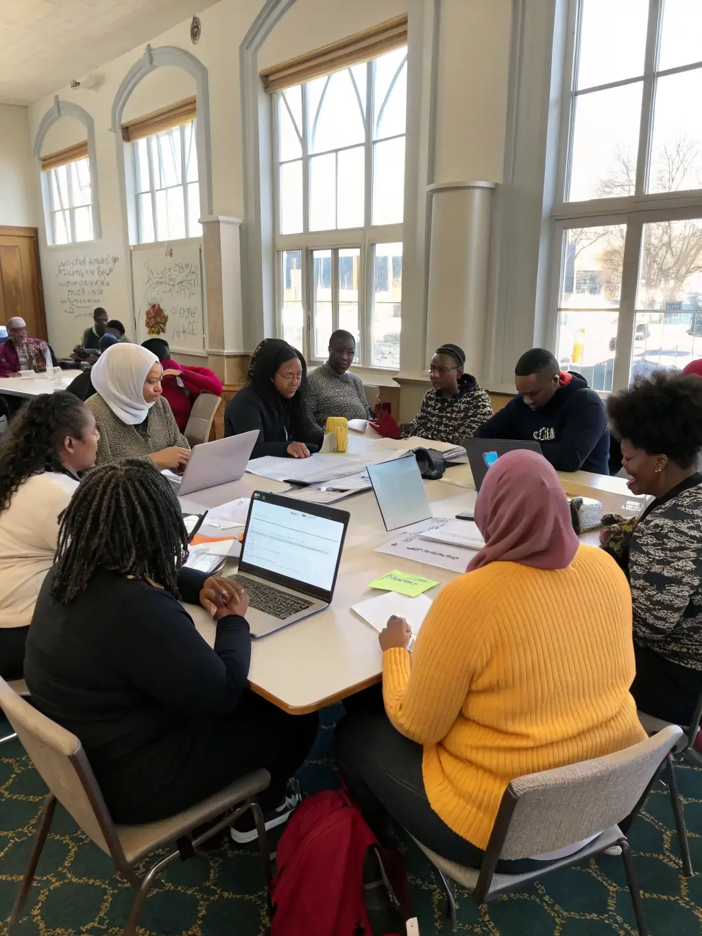 A photo of a workshop session led by CDOSA volunteers, educating local community members about the core values and principles of the Olympic movement.